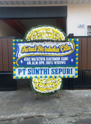 Papan Bunga Duka di Yuneri
