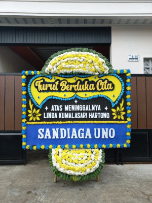 Papan Bunga Duka di Yuneri